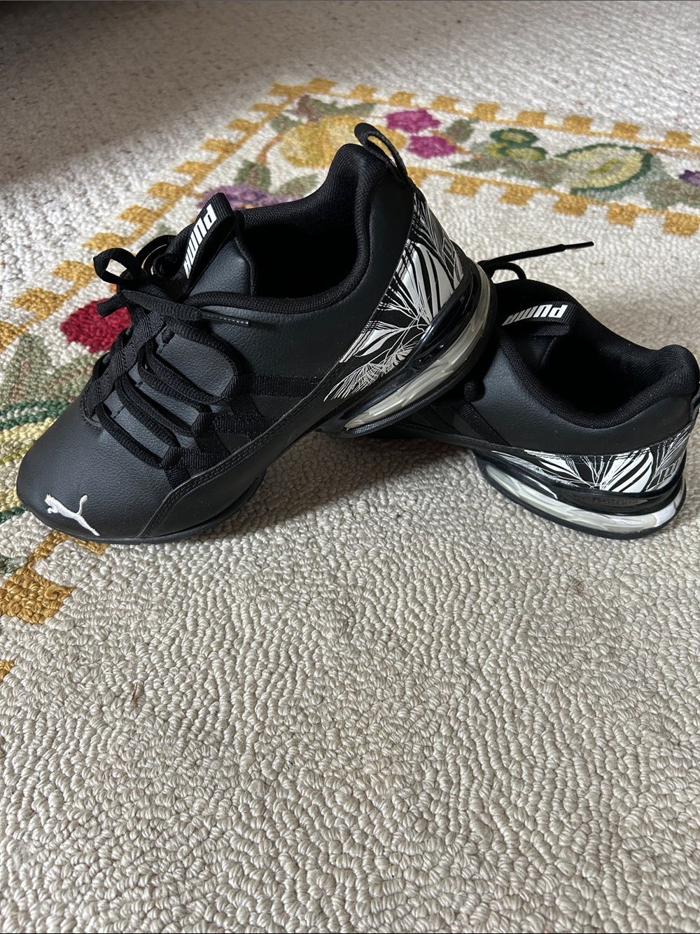Puma Women’s Black Sneakers with White Graphic Accents